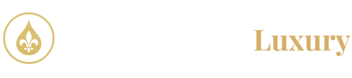 Blue Cleaning Luxury logo. Gold logo with a fleur-de-lis and the word 'Luxury' on a white background